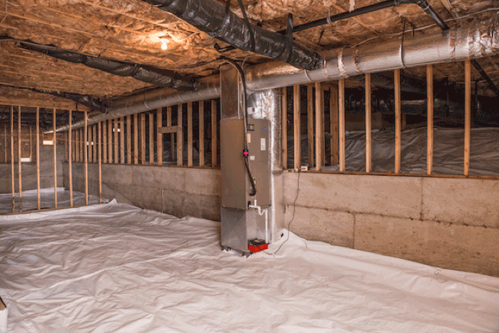 Crawl space outfitted with a vapor barrier to protect the house and its residents