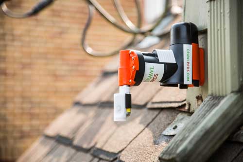 Crawl Pros professional rodent damage equipment installed on the outside of a home