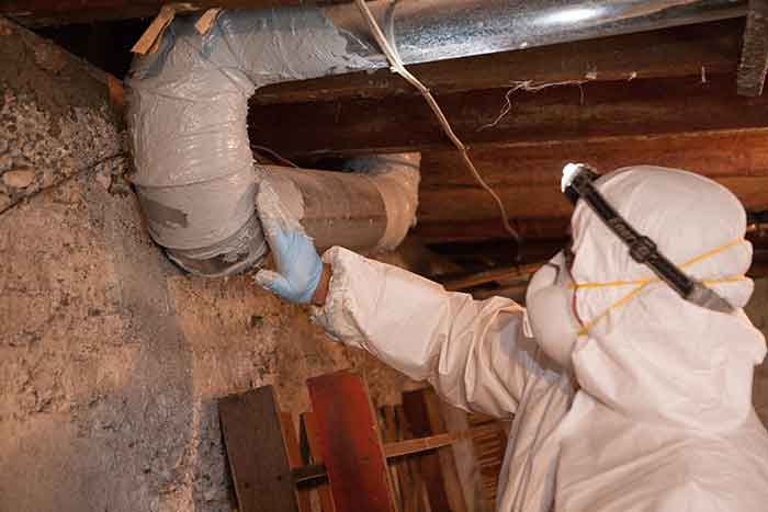 Crawl Pros professional sealing air ducts to help lower energy and utility bills