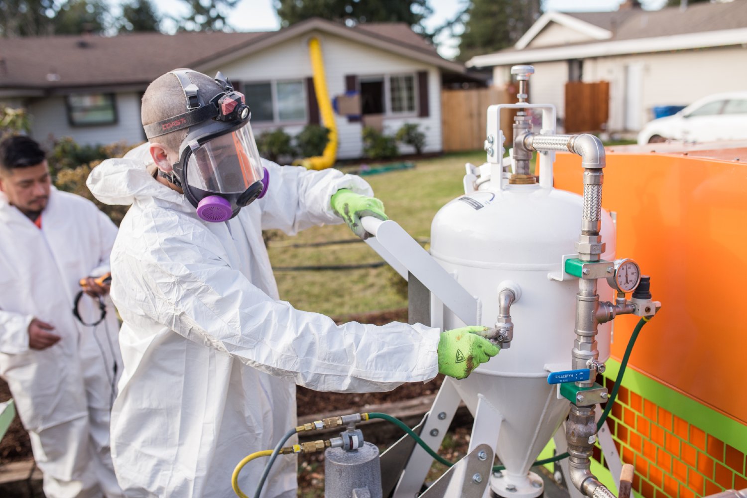Crawl Pros professional preparing tools to perform a crawl space mold removal Monroe